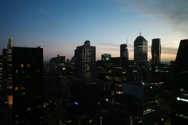 a city at night lit up with some lights on