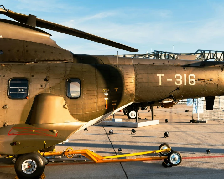 an airplane is parked on the runway for service