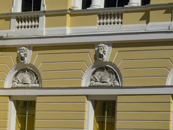 decorative details are seen on the front side of a building