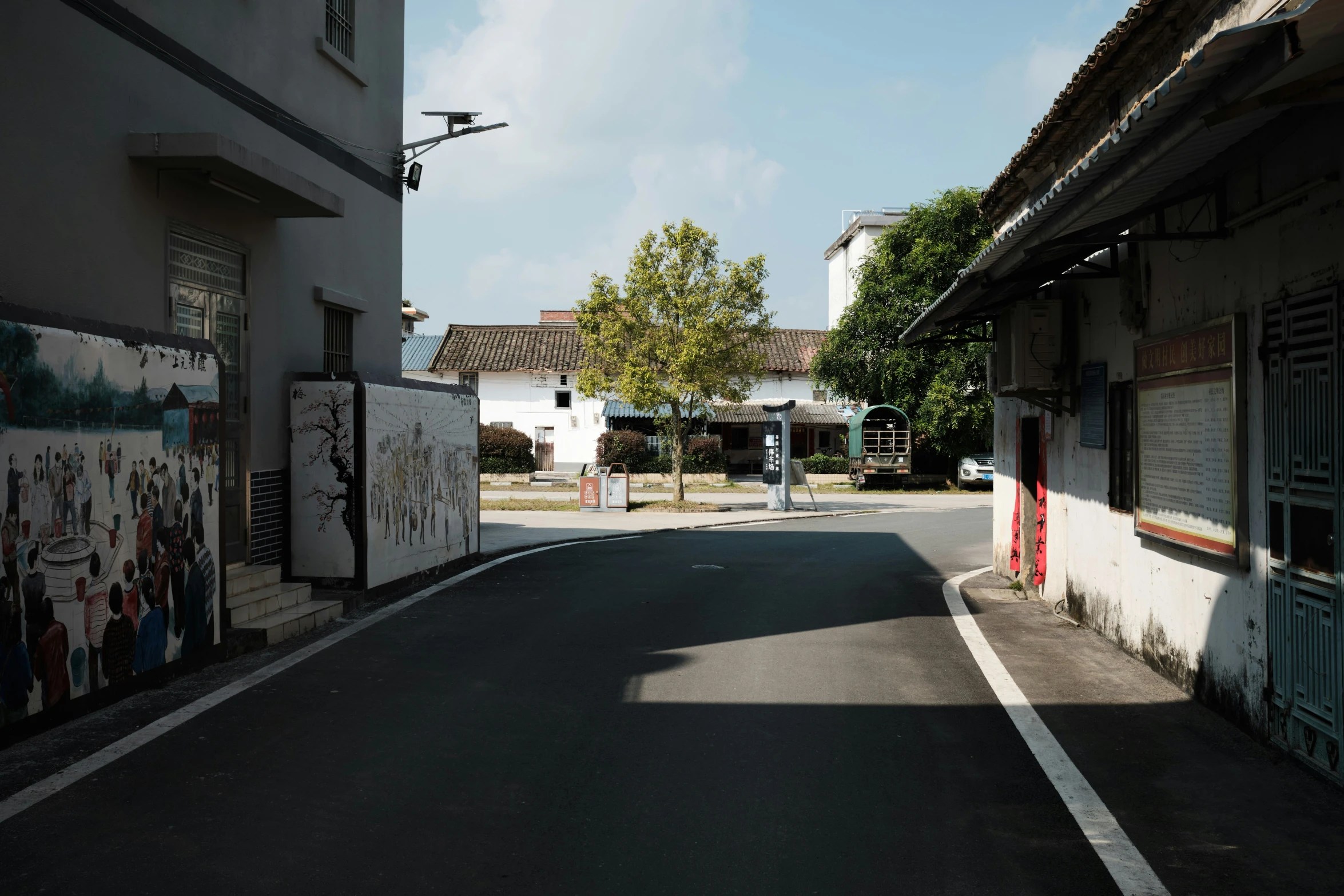 there is an empty road between two buildings