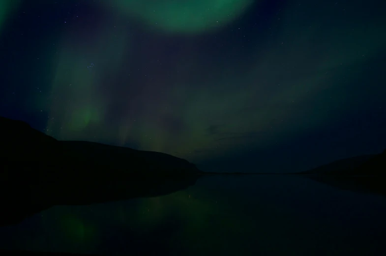the aurora over a lake at night