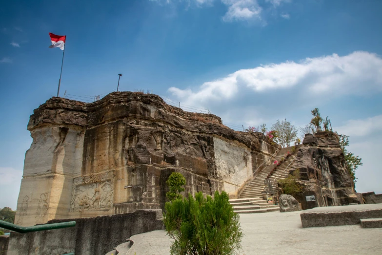 there are a few very pretty ruins with flags on top