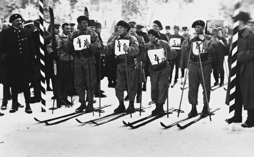 a row of skiers standing around while holding crosses