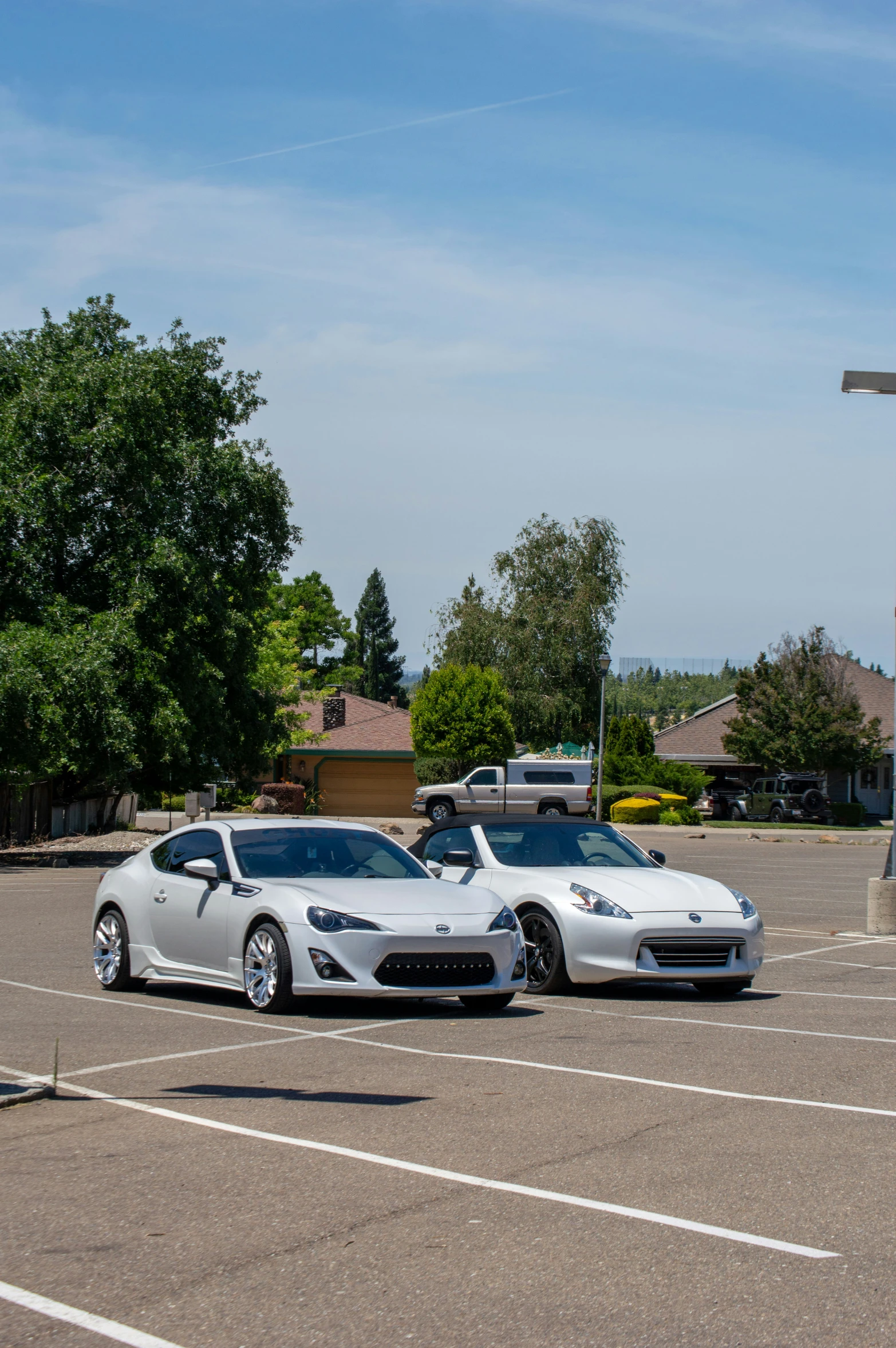 a couple of cars are parked in a parking lot