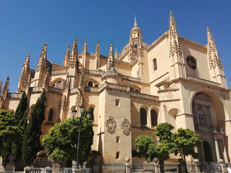 an old castle with ornate roof architecture