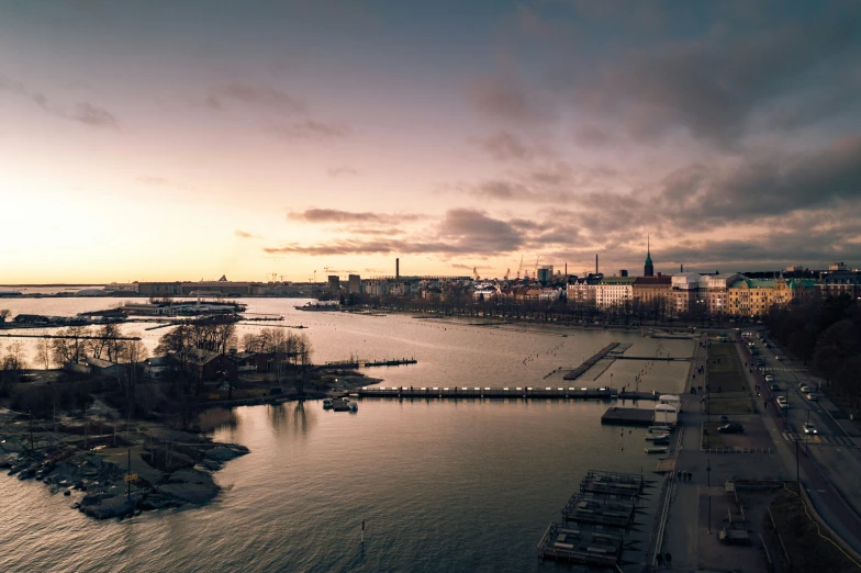 an aerial view of a body of water in the evening