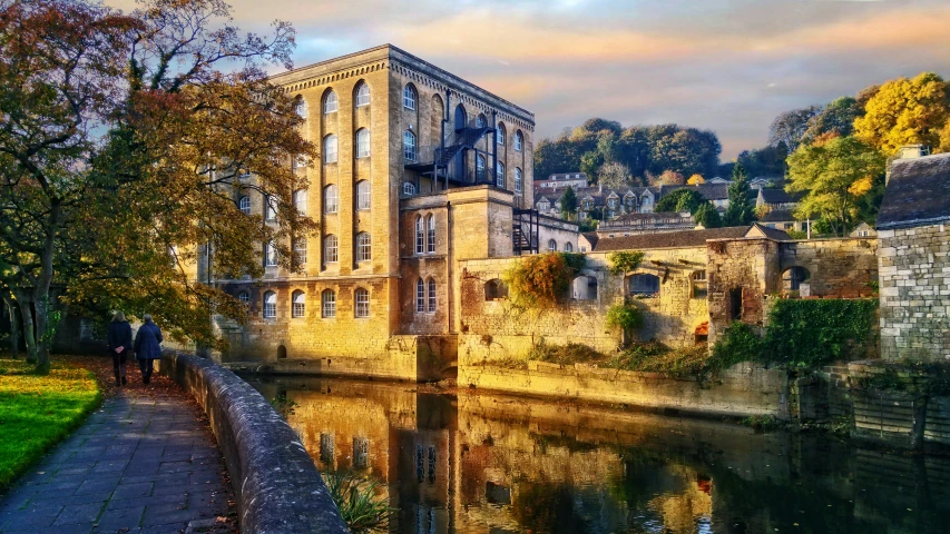 the reflection of buildings in water is shown