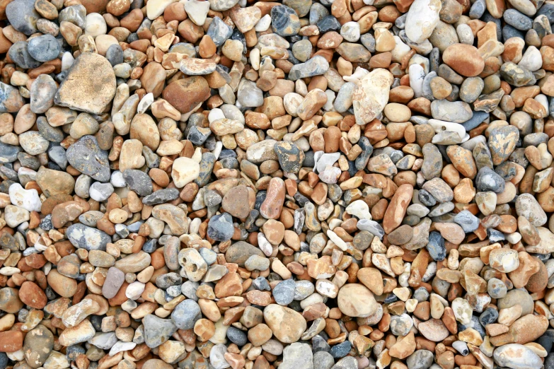 a pile of rocks that are in the dirt