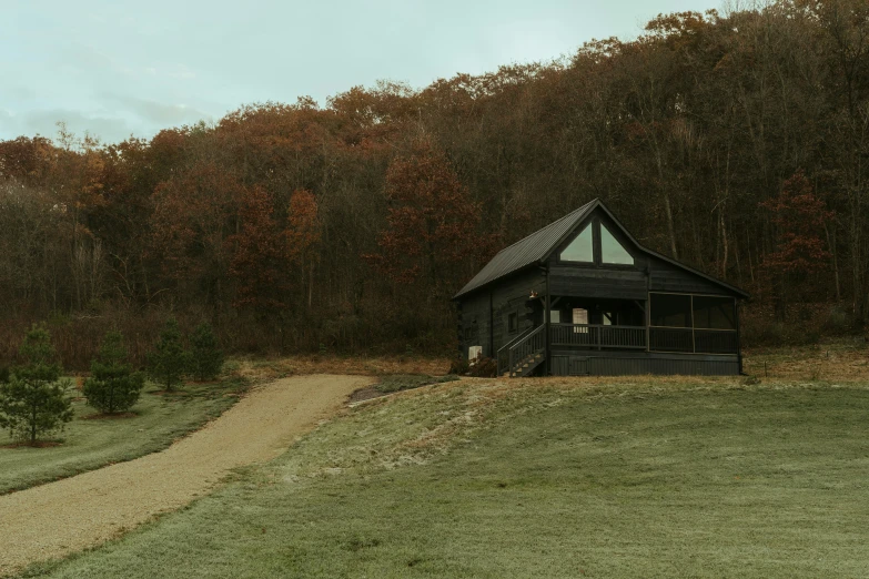 the barn has a porch for horses to stay