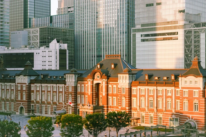 the large building is in front of some very tall buildings