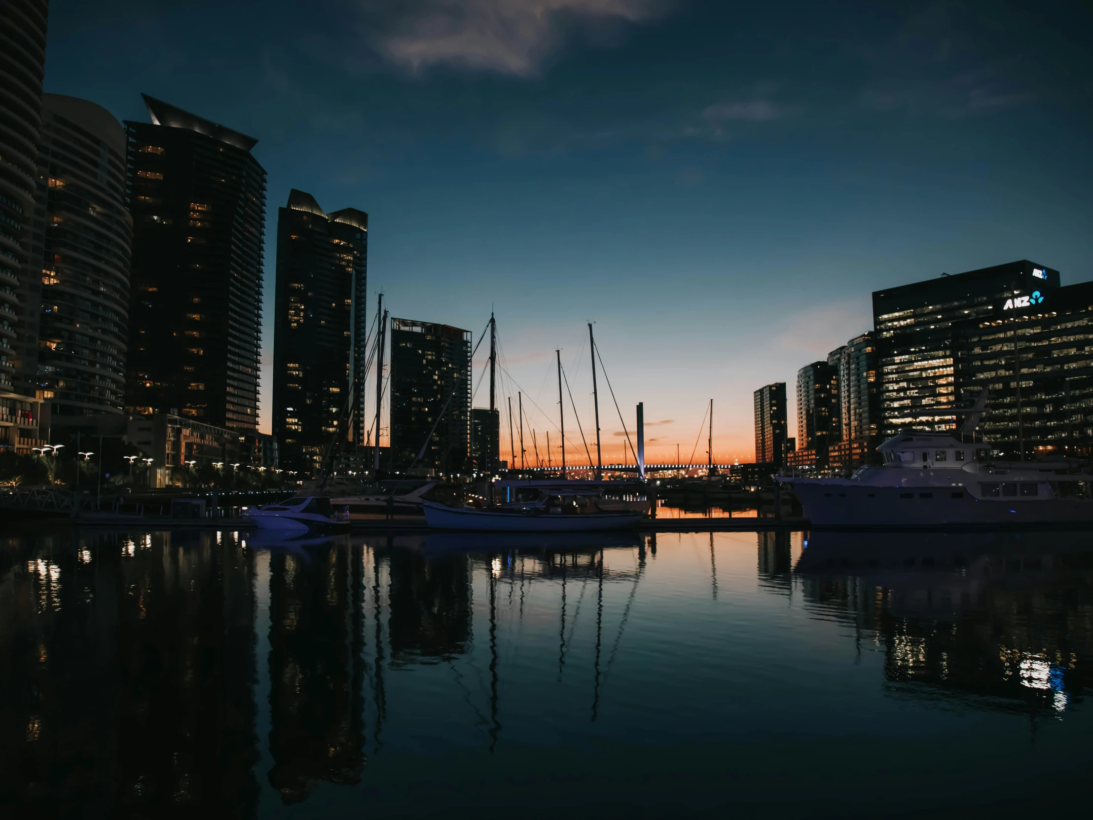 night time cityscape of a large body of water