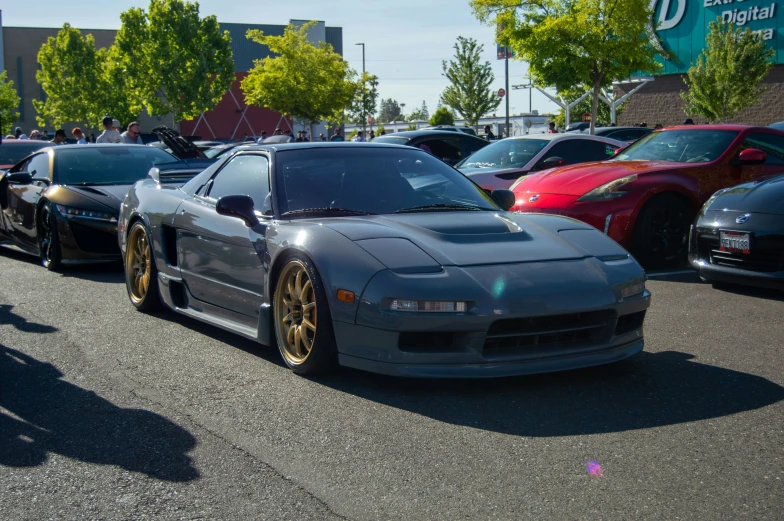 the sport car is parked on the side of the road