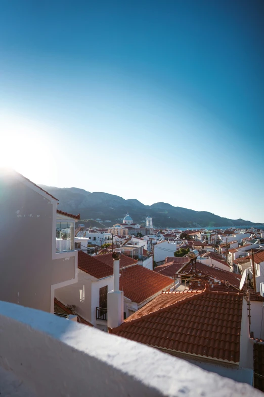 a sunny day in the city with rooftops and rooftop top view