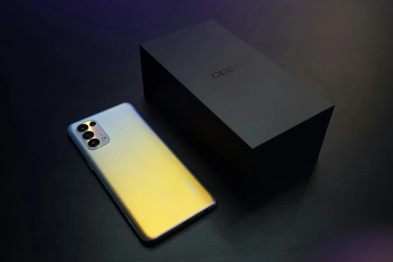 the new oppo phone is displayed next to it's box