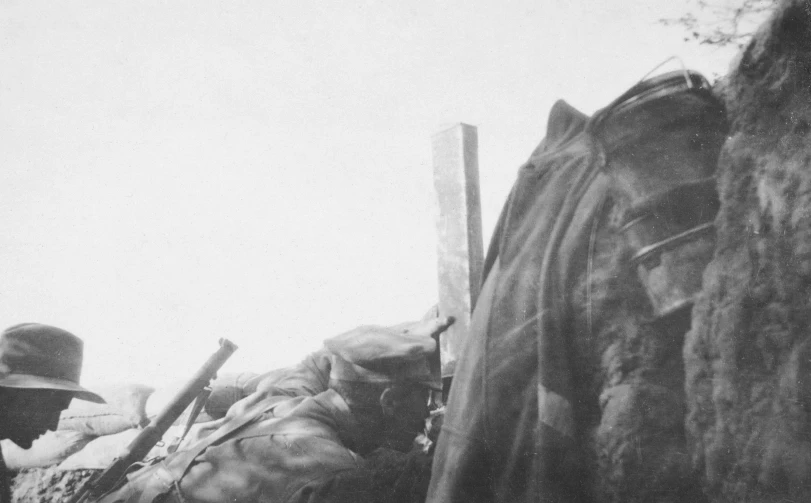 a black and white image of two men in uniforms