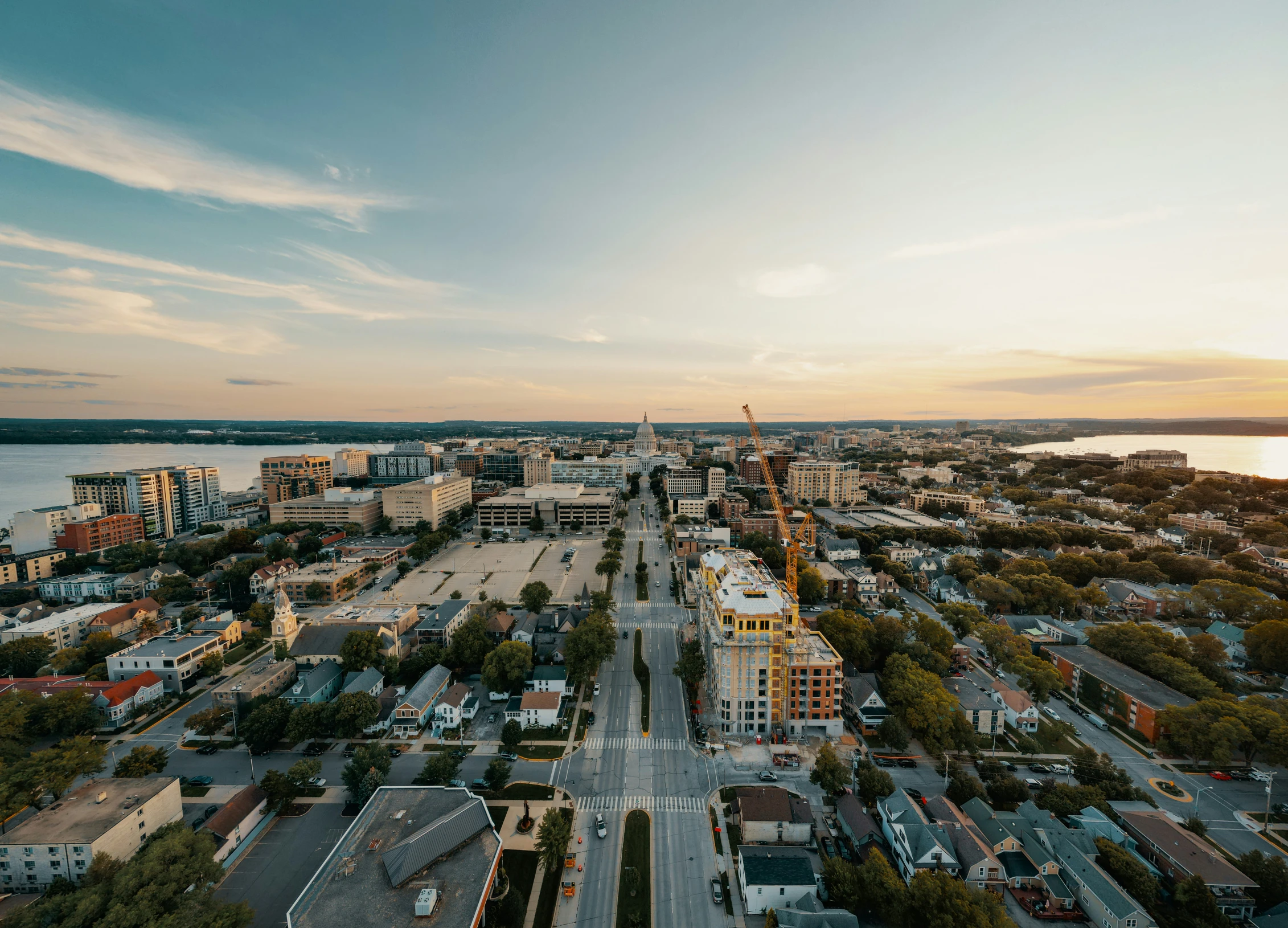 an aerial view of city buildings and trees