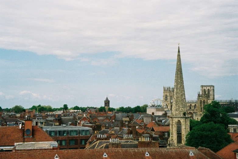 a church steeple in the middle of a city