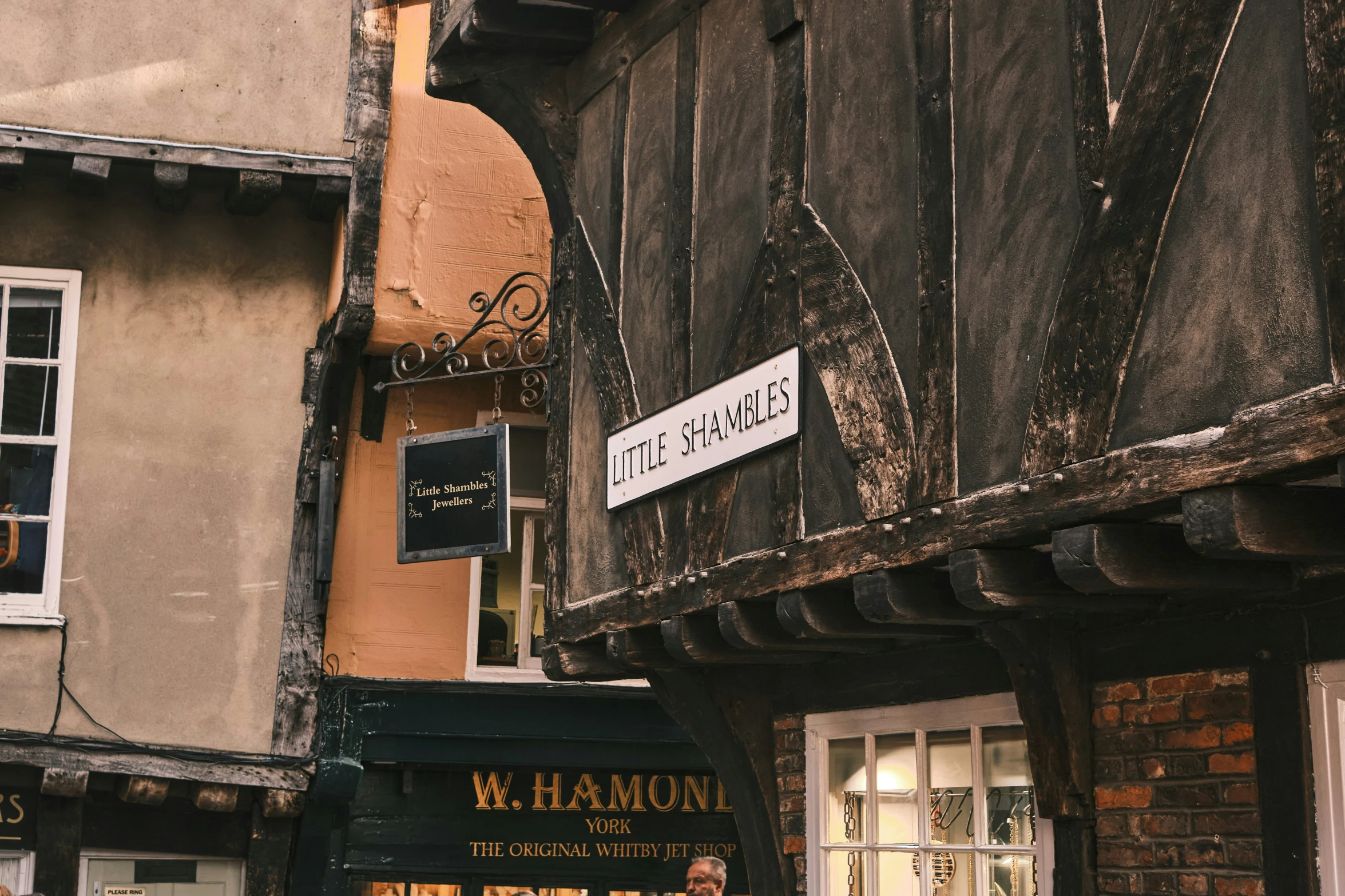 the storefront and side of a building