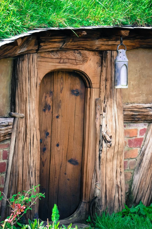 this is an old, worn out door on a rustic looking building