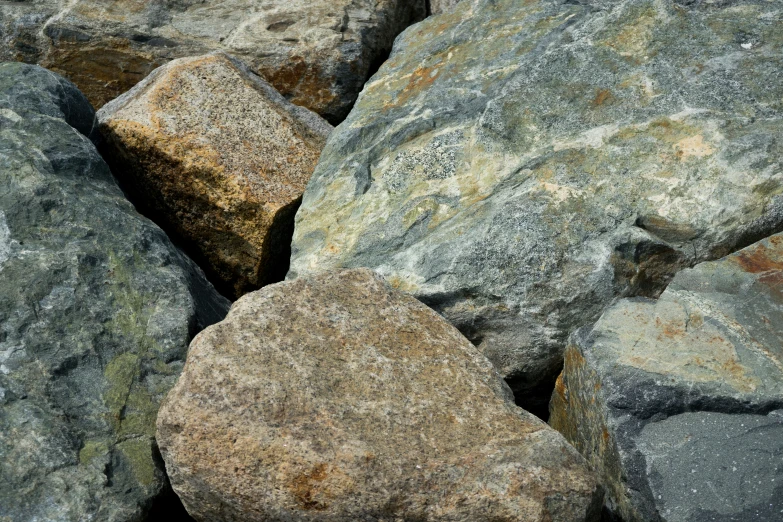 an image of some rocks in the grass