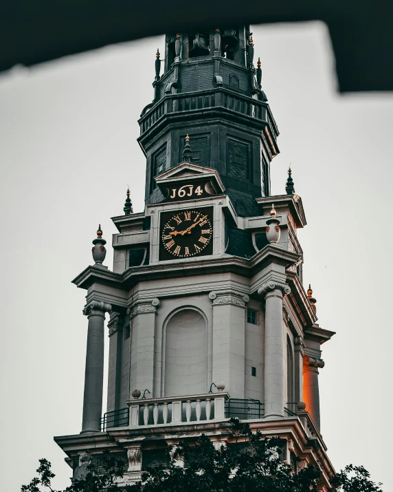 the tower has a clock on it that is built into the building