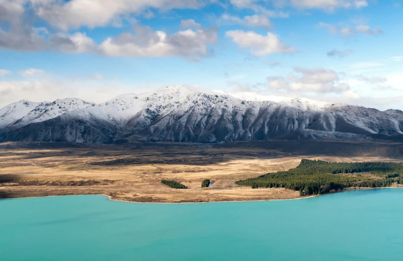 the landscape of a country near a lake