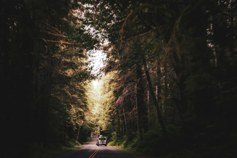 a long road with two people on the front