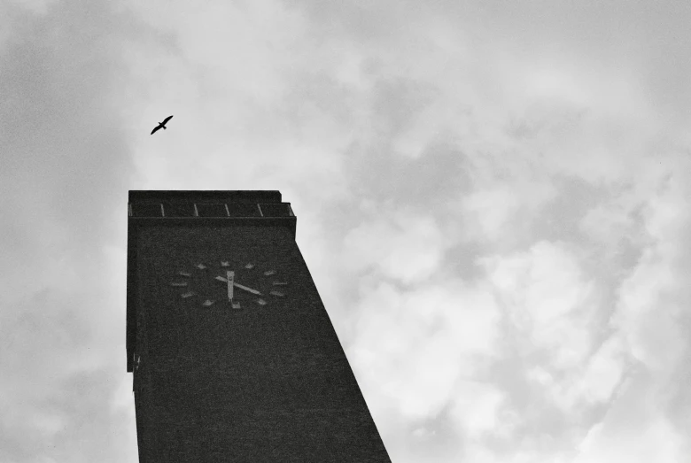 a black and white po of the top of a tower