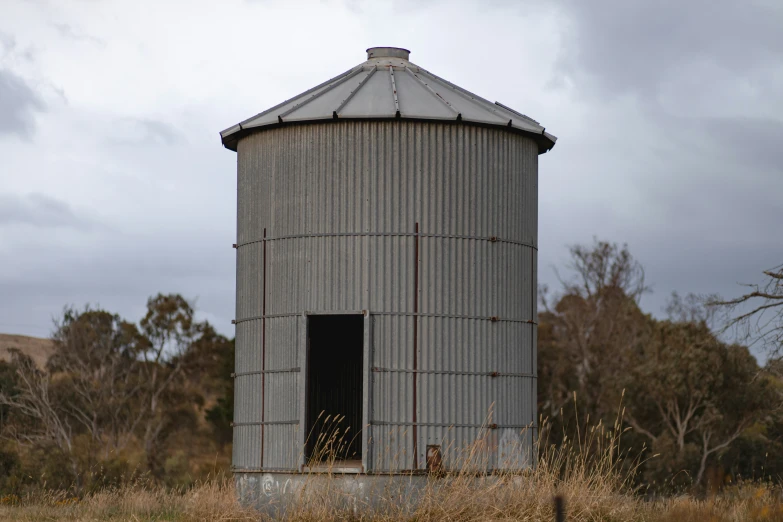 a building that has an open door with an out door on it