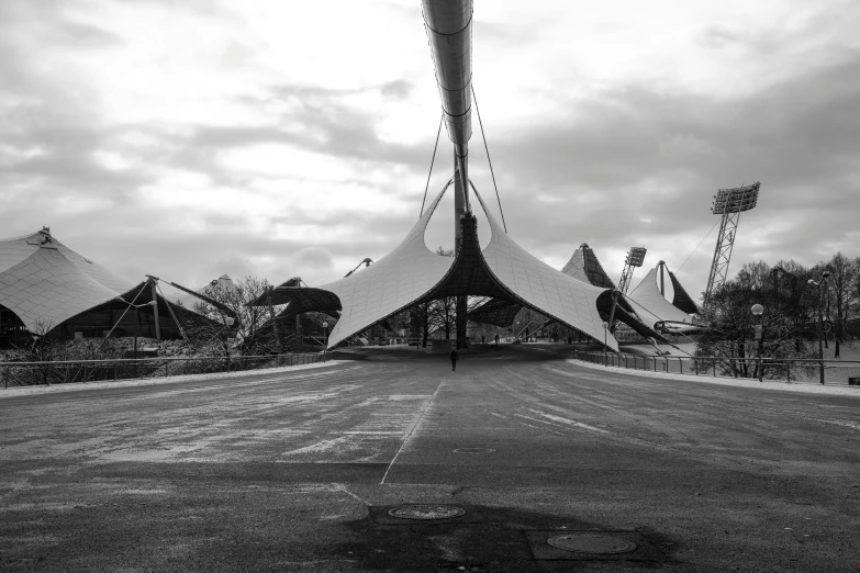 an empty field with many tents in it