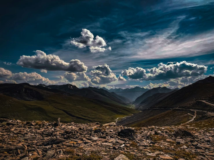 a landscape with a sky view over mountains