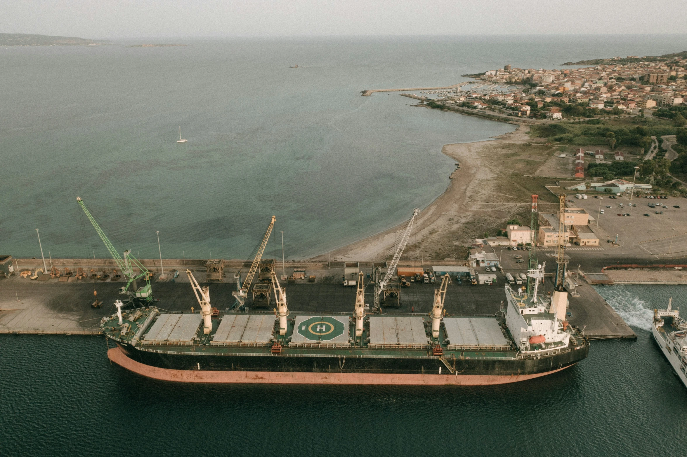 a large boat at the dock in a harbor