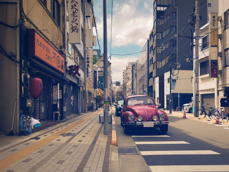 cars going down a street in china city