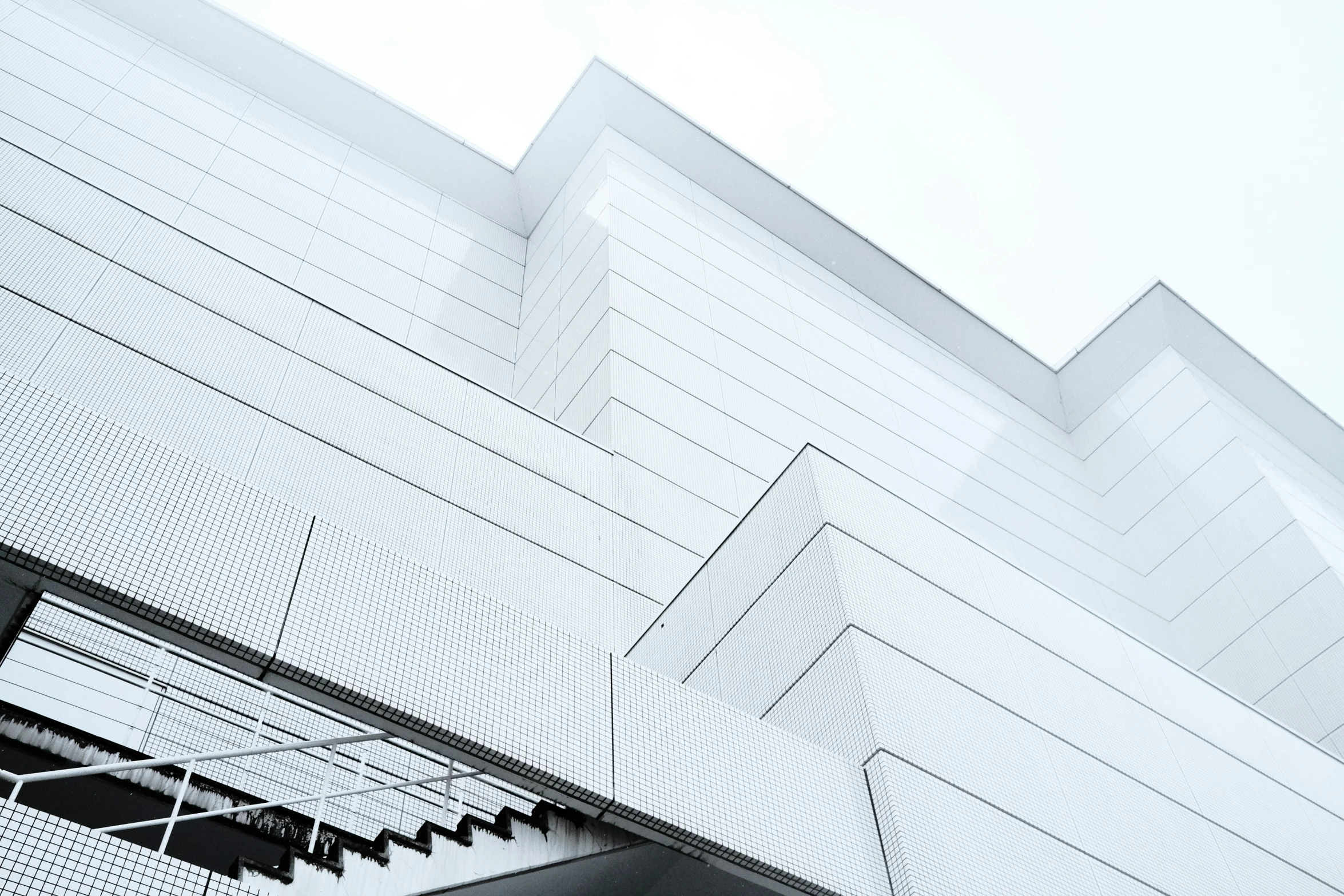 a white building with a bunch of stairs