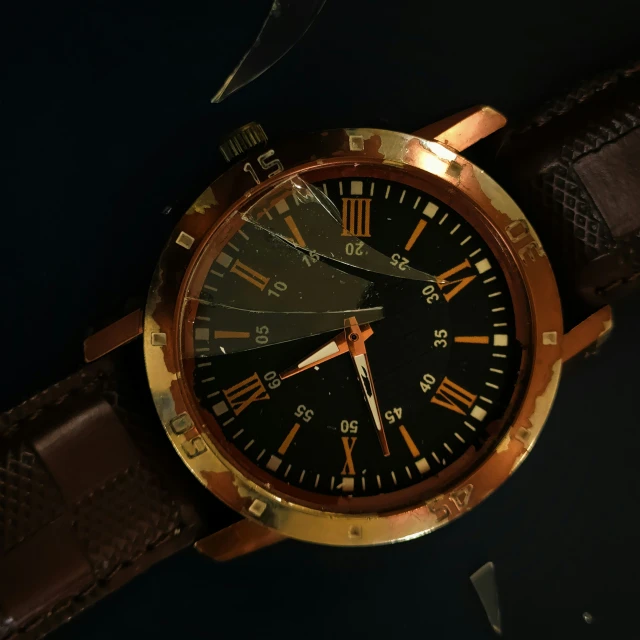 the black watch is made with gold - plated metal