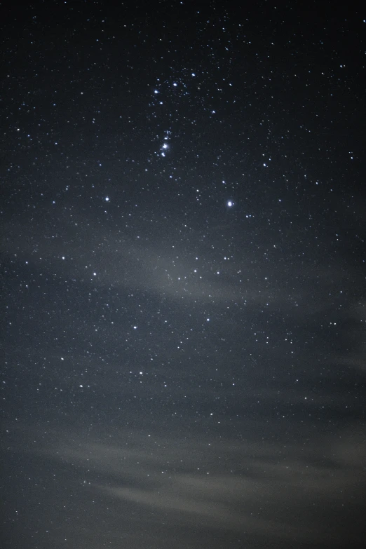 a night scene with an airplane under the stars