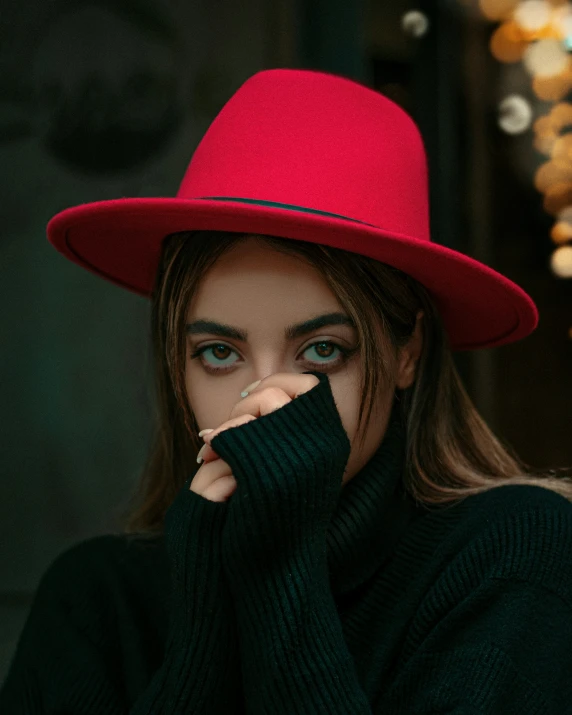 woman with red hat, cigarette and black shirt