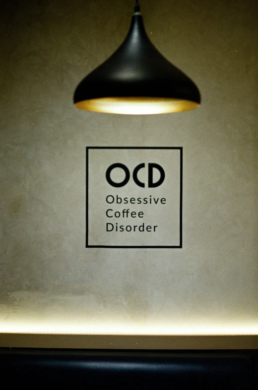 the front cover of an object that reads obsesive coffee dissor