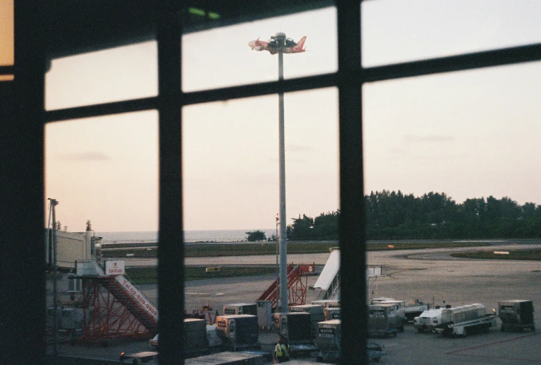 an airplane sits on the runway at the airport