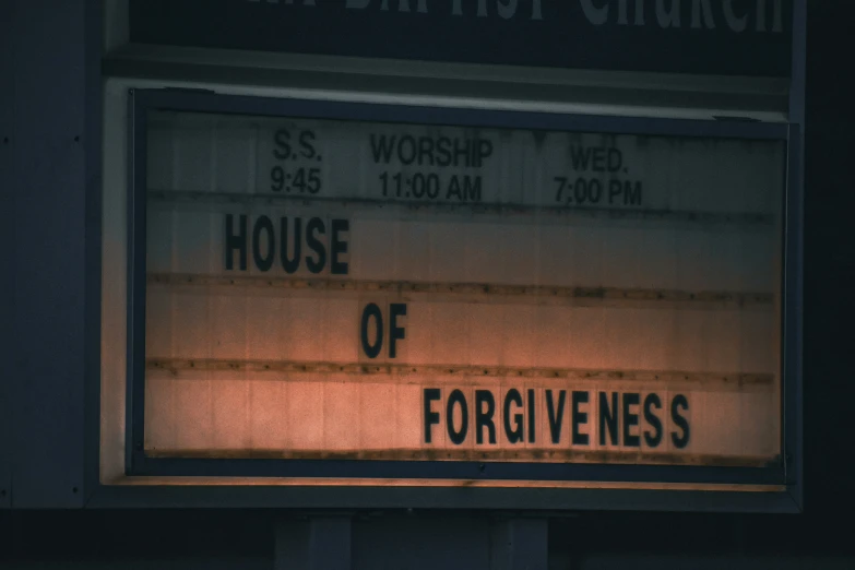 a sign reading house offoruveness outside a church