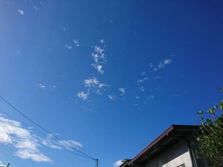 a blue sky with some clouds in it