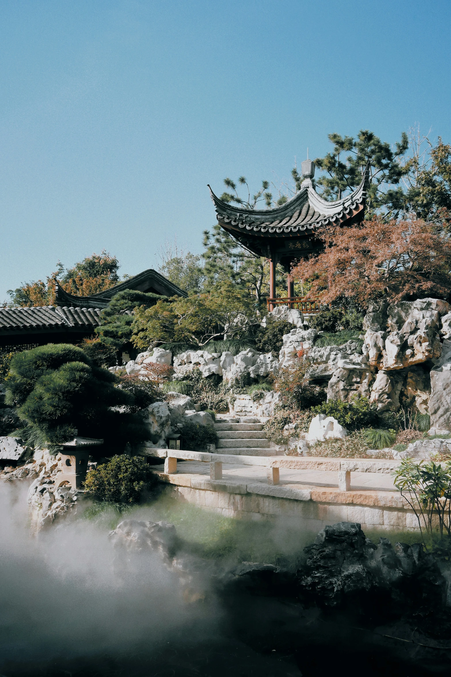 a beautiful scene of oriental architecture in the fog