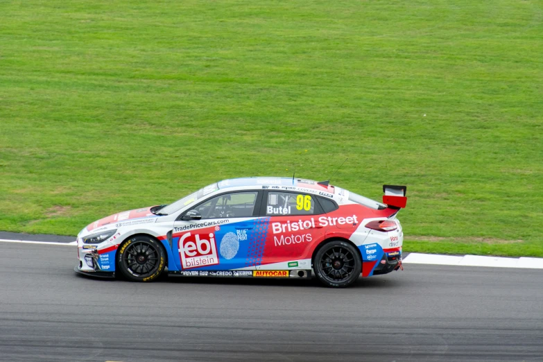 a person driving a race car on a track