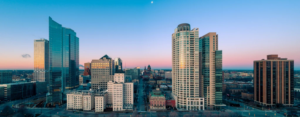 a bird eye view of city with tall buildings