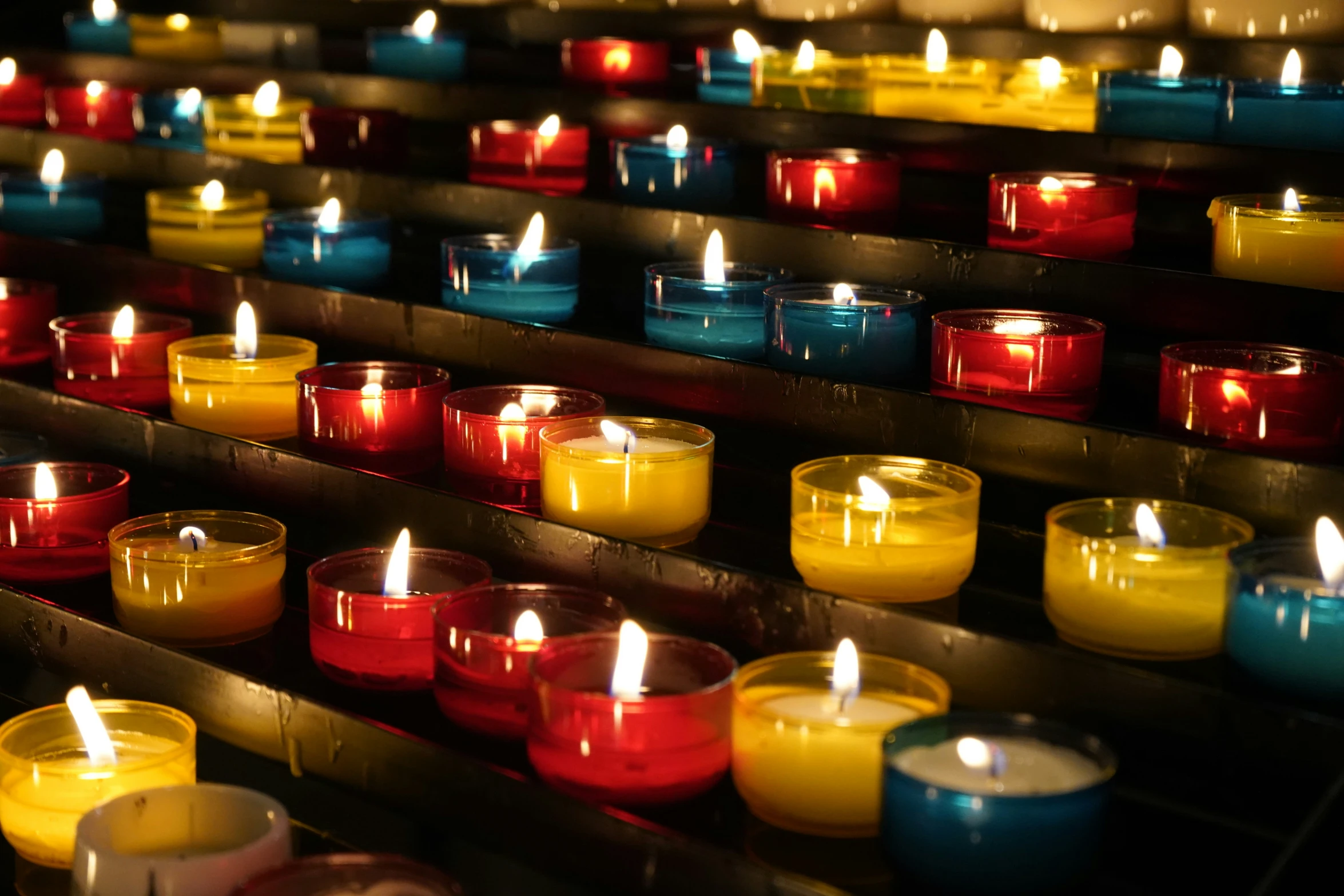 several candles are lit up and being displayed