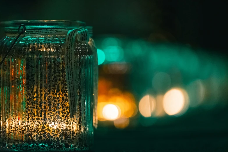 a closeup of a light in a glass jar