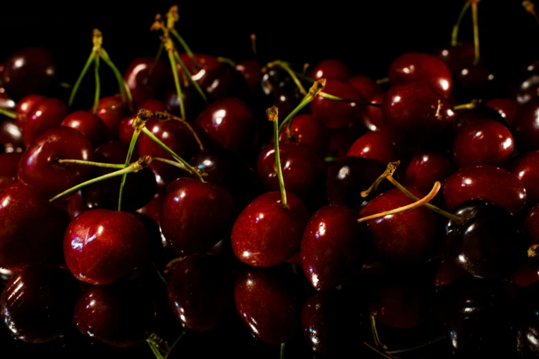 a bunch of cherry halves sit together