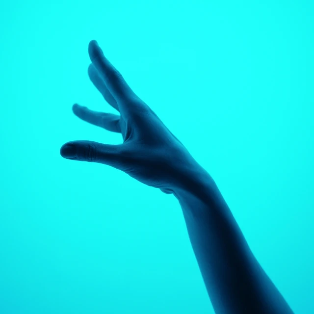 hands reaching up towards the ocean water for soing