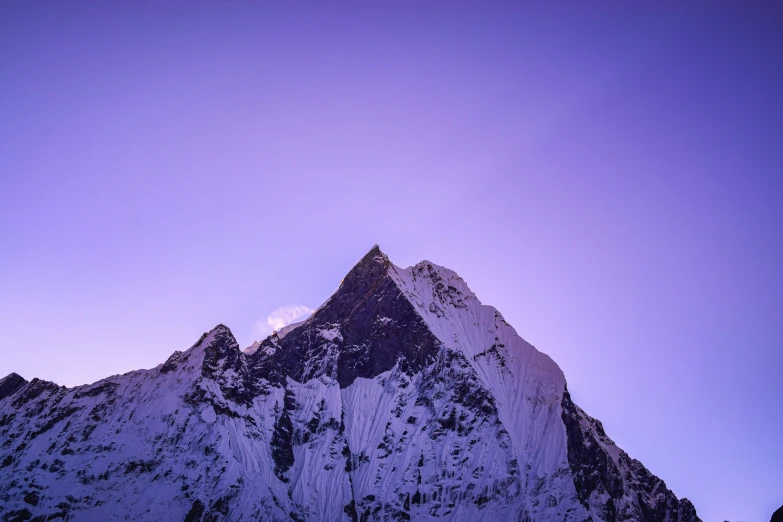 a tall mountain with a sky background