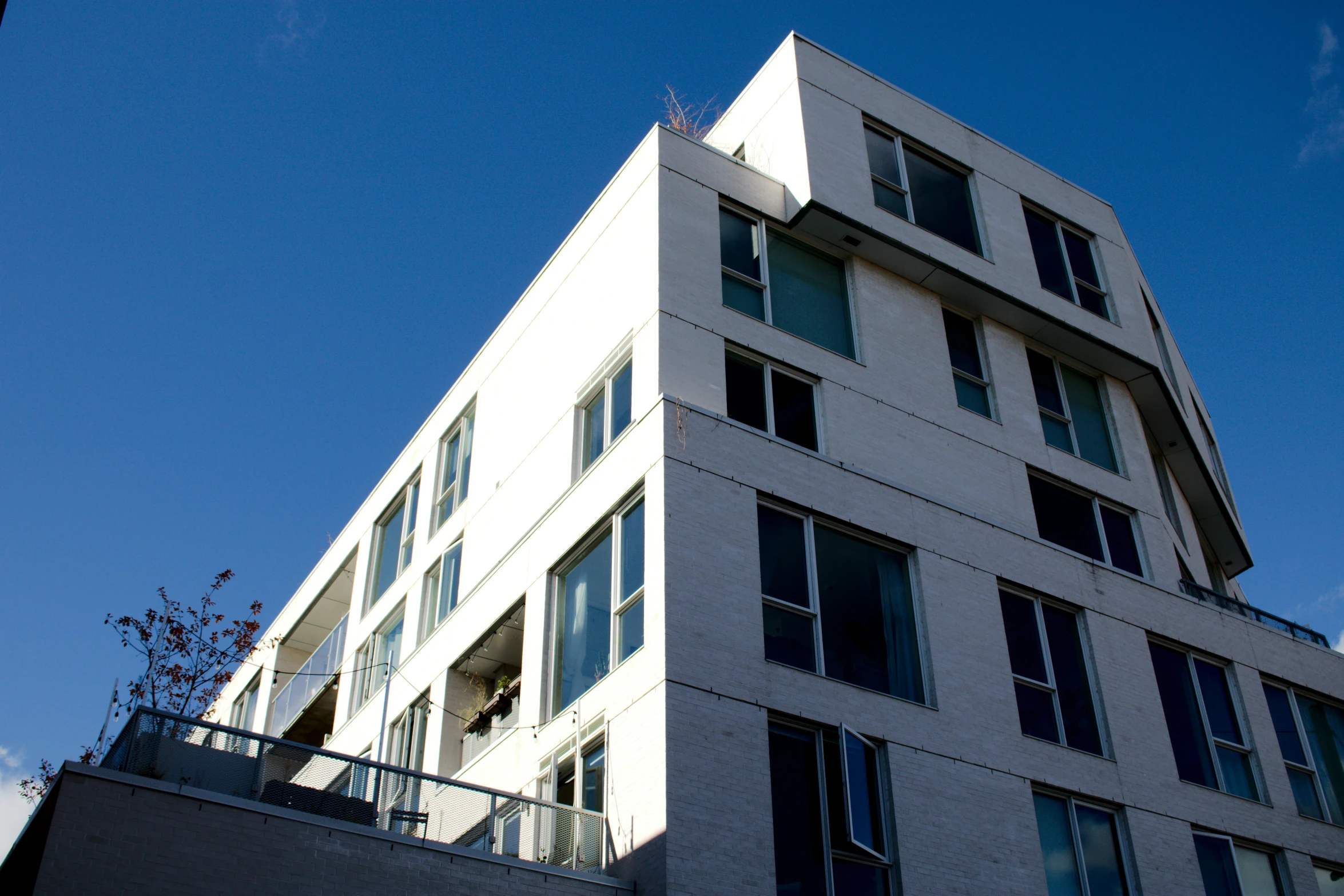 a view of an office building with balcony